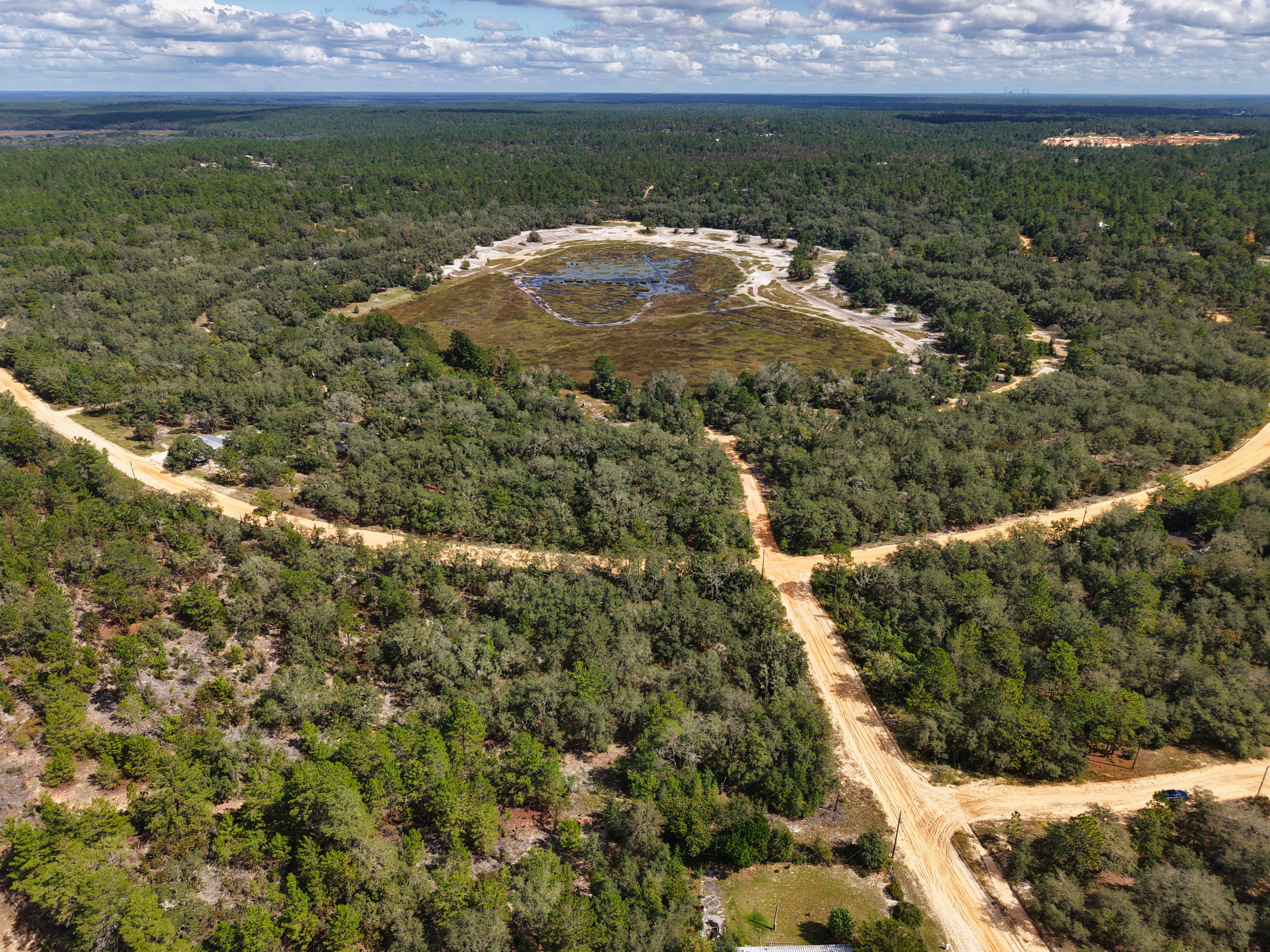 The Elevated Estate: 0.29 Oversized Acres of High & Dry Freedom — property view 5