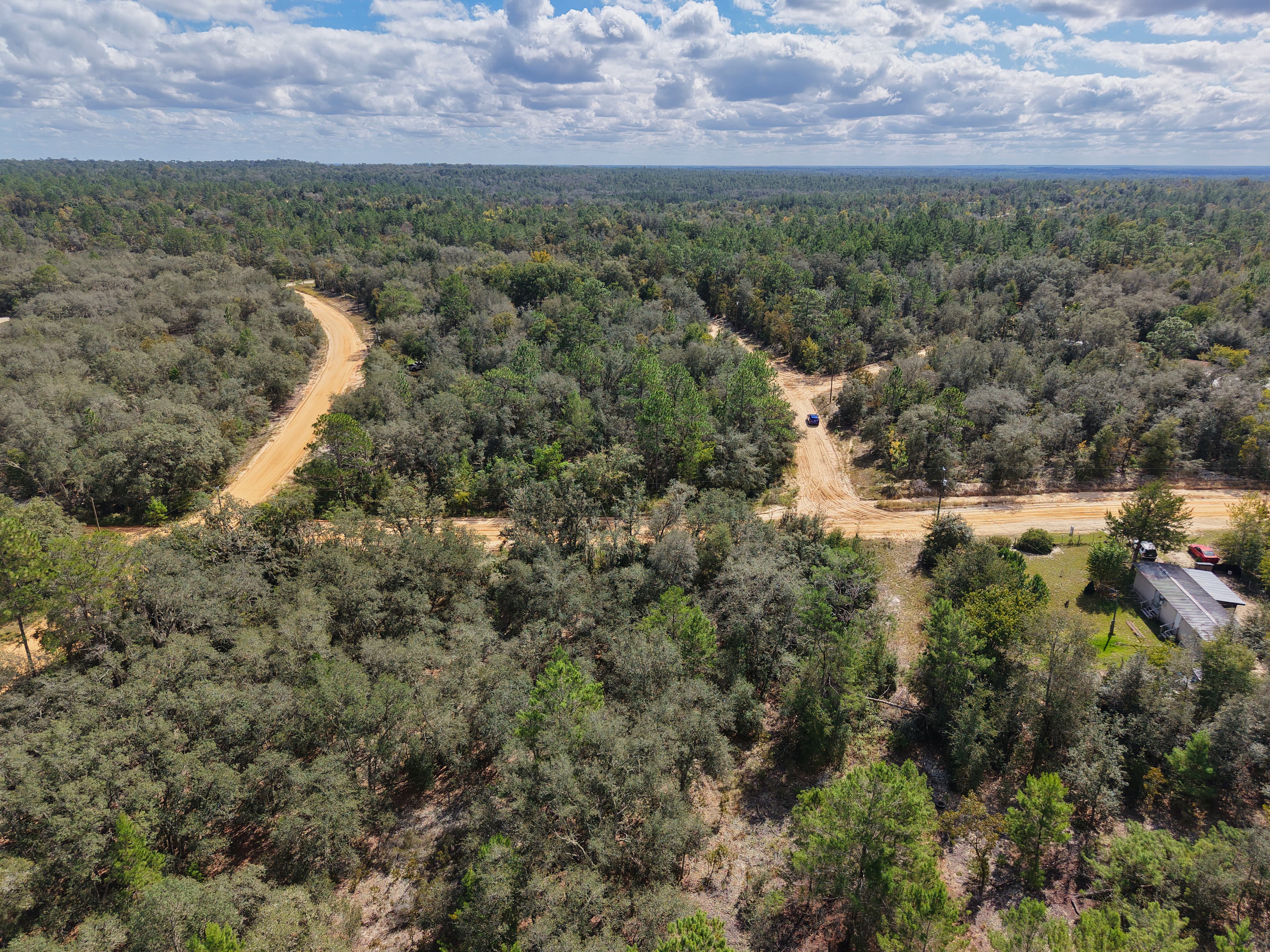 The Elevated Estate: 0.29 Oversized Acres of High & Dry Freedom